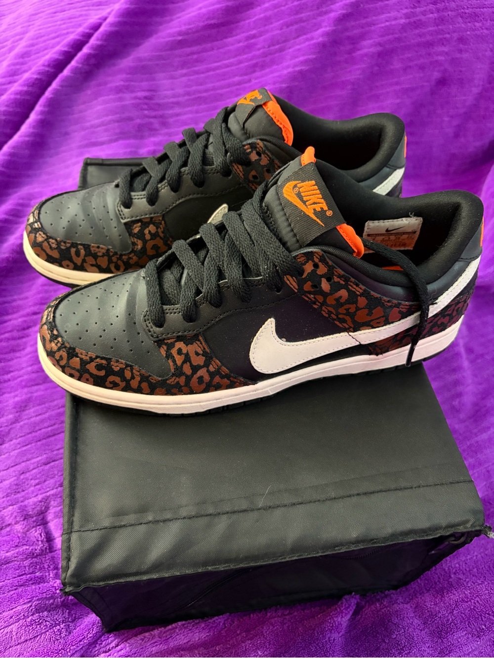 Nike Women’s Low-Top Sneakers in Black with Brown Leopard Accents